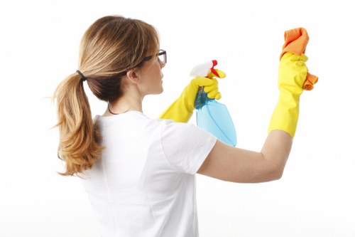 Cleaning a modern armchair in New Eltham
